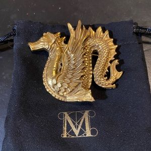 Museum replica dragon brooch